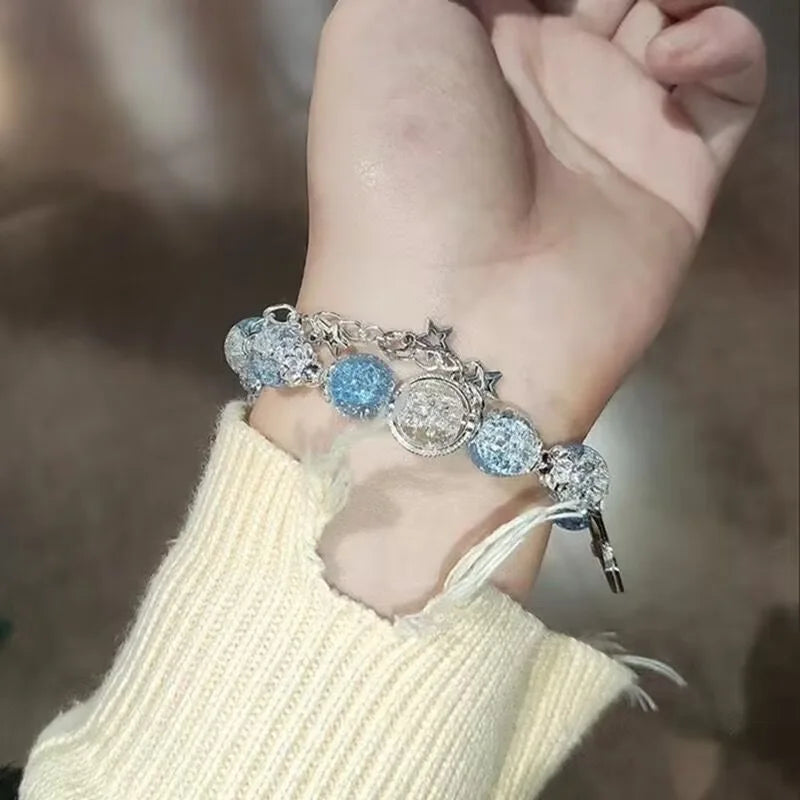 Pulsera con borlas y cadena de estrella para mujer, diseño de nicho, cuentas de cristal azul de fantasía, pulsera de cuerda elástica, regalos de joyería para mejores amigos